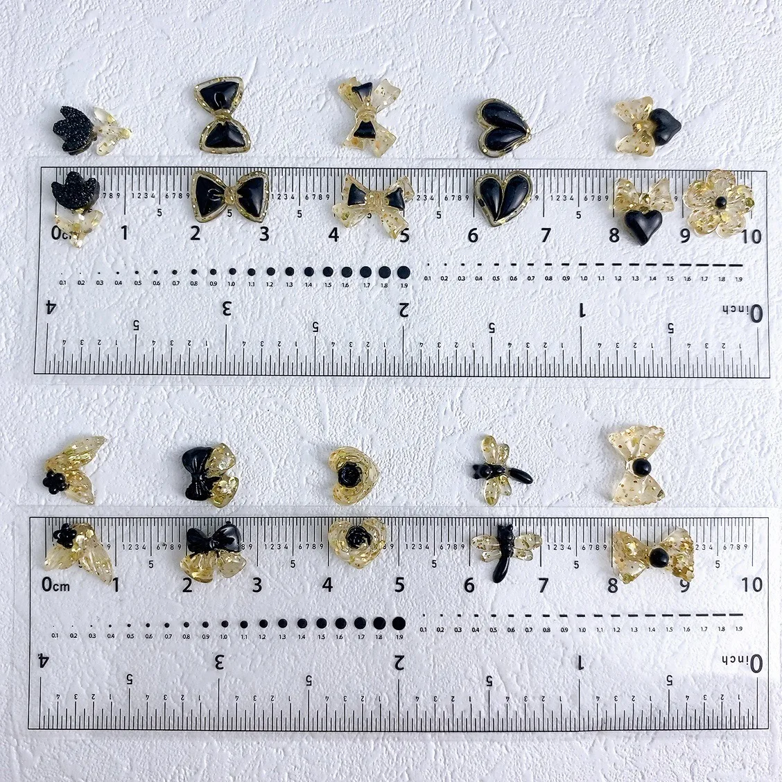 อุปกรณ์ตกแต่งศิลปะเล็บทำจากเรซิ่น3D 30ชิ้นวัสดุกากเพชรสีทองและสีดำโบว์รูปหัวใจสำหรับอุปกรณ์ทำเล็บ