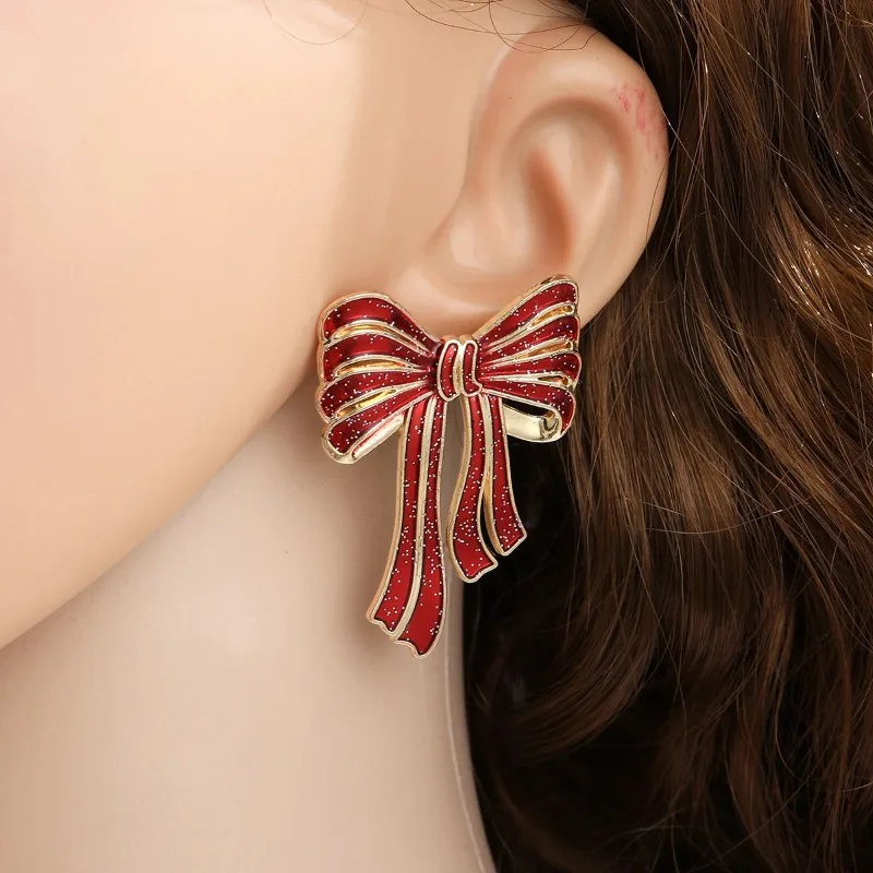 A Pair of Fashionable New Red Bow Earrings Environmentally Friendly Alloy Dripping Oil Creative Earrings Christmas Earrings