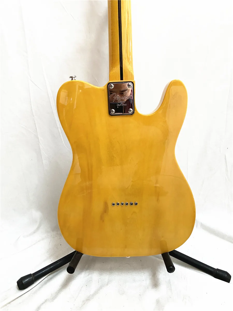 Custom left hand light yellow 6 string electric guitar maple neck black guard plate can be customized free shipping