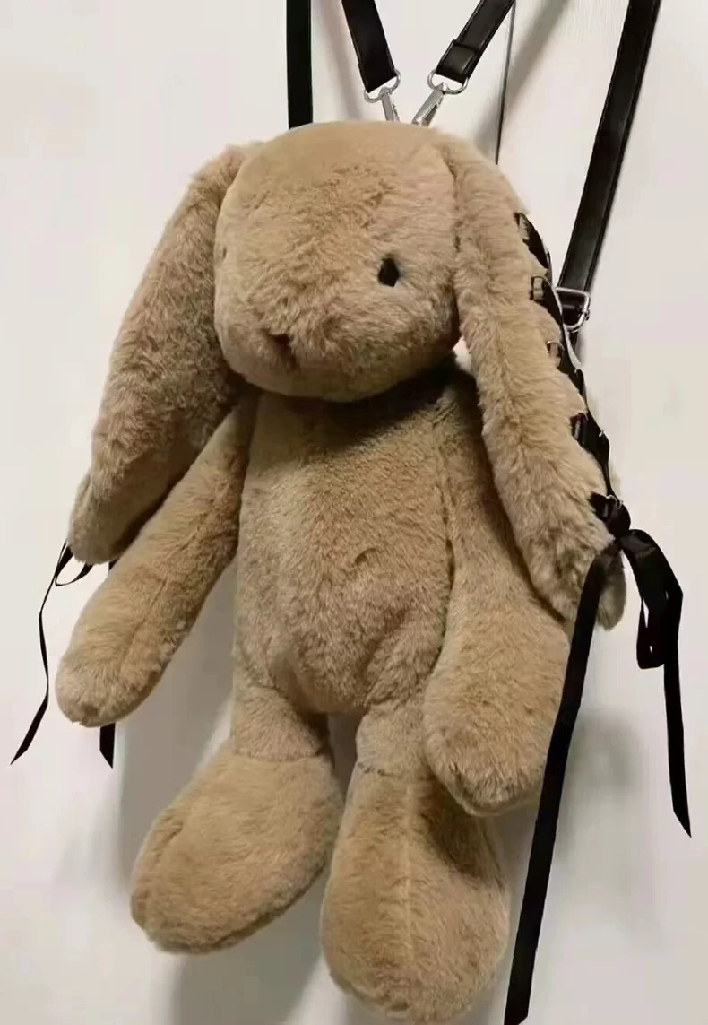 2024 Mochila de conejo de peluche con diseño de nicho popular Mochila de conejo de piel con correa de encaje linda y versátil Mochila de moda personalizada Bolso de lujo de moda Recomendación del centro comercial