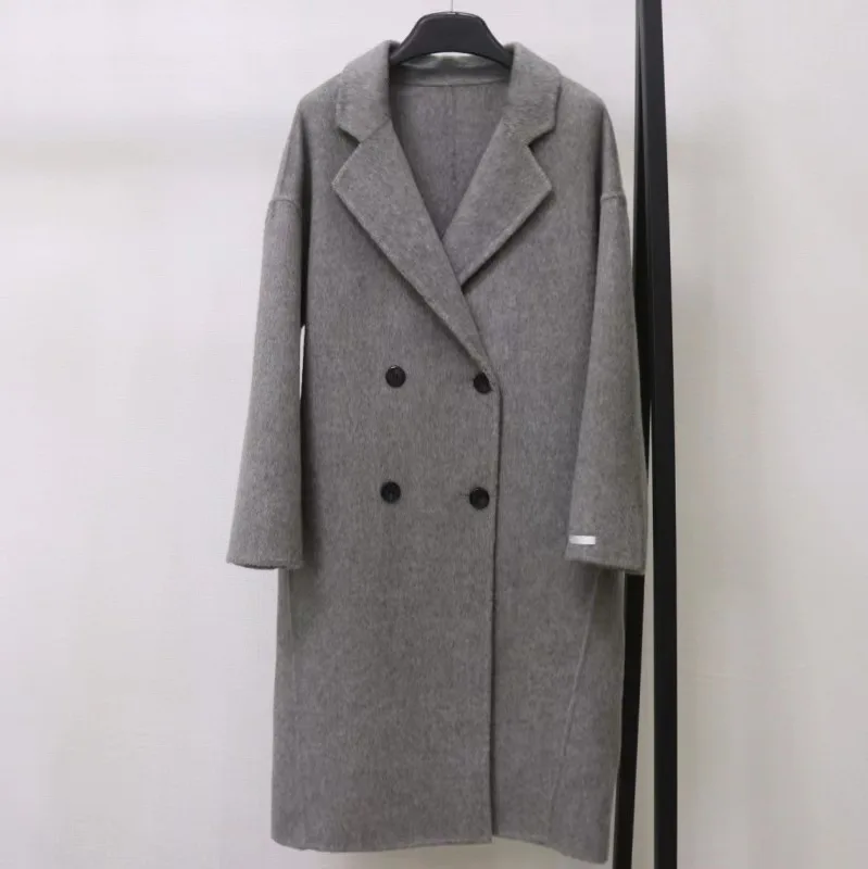 2025 Cappotto di lana con petto abbassato da donna primaverile Cappotto invernale in cashmere stile sciolto Cappotti lunghi Top Nuovo