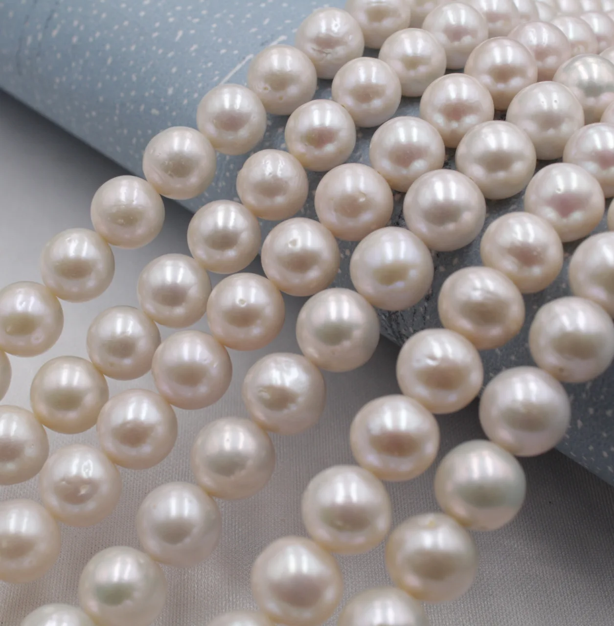 

10-11mm white cultured natural real freshwater pearl wholesale bulk round freshwater pearls