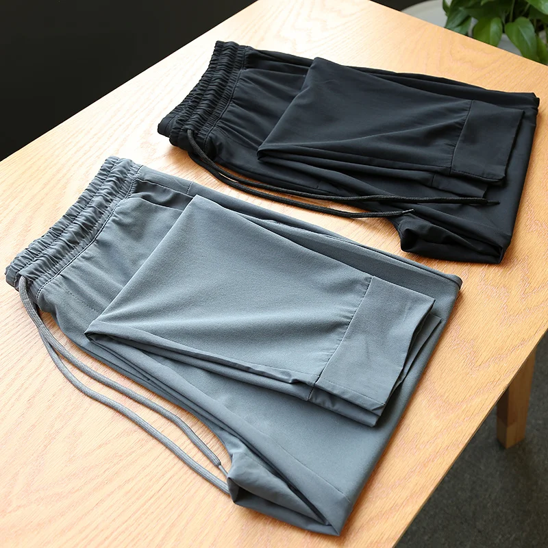 

Легкие высокоэластичные мужские летние повседневные спортивные брюки Qui Dry, свободные длинные брюки, модные городские брюки