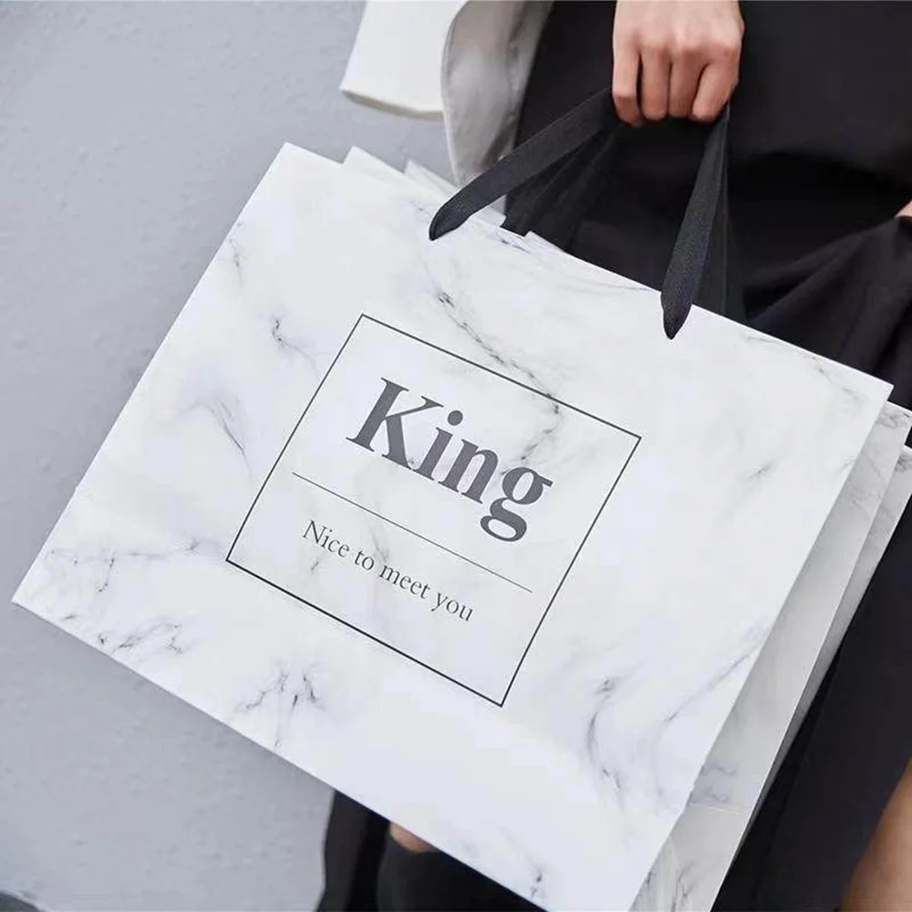 500pcs/Lot Wholesale Luxury Recyclable Biodegradable Paper Bags for Clothing Boutique Gift Packaging with Your Own Logo Printed