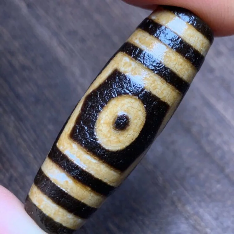 

Wholesale Tibetan Tooth Yellow Three Eyes Tibet Beads High Oil Agate Tibet Beads DIY Ornament Necklace Pendant Ornament