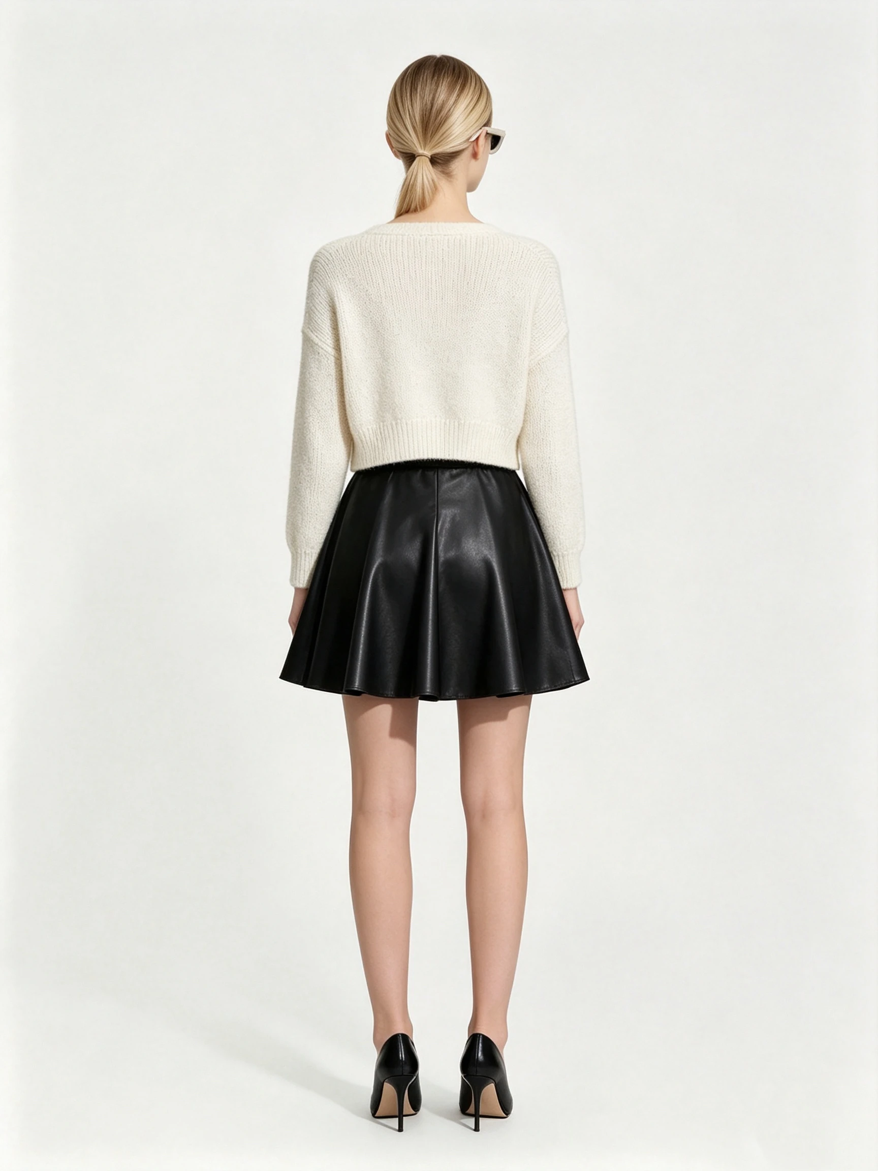 Women's Faux Leather High-Waisted Pleated Mini Skirt with Wide Waistband and A-Line Silhouette