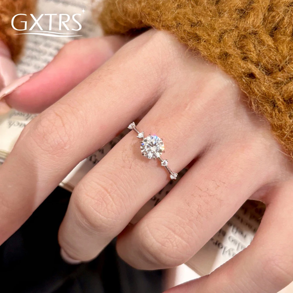 

Кольца из стерлингового серебра 925 пробы с настоящим муассанитом GXTRS 1CT для женщин, сверкающие кольца с искусственными бриллиантами для свадьбы и вечеринок, тонкие кольца, изысканные ювелирные изделия, подарки