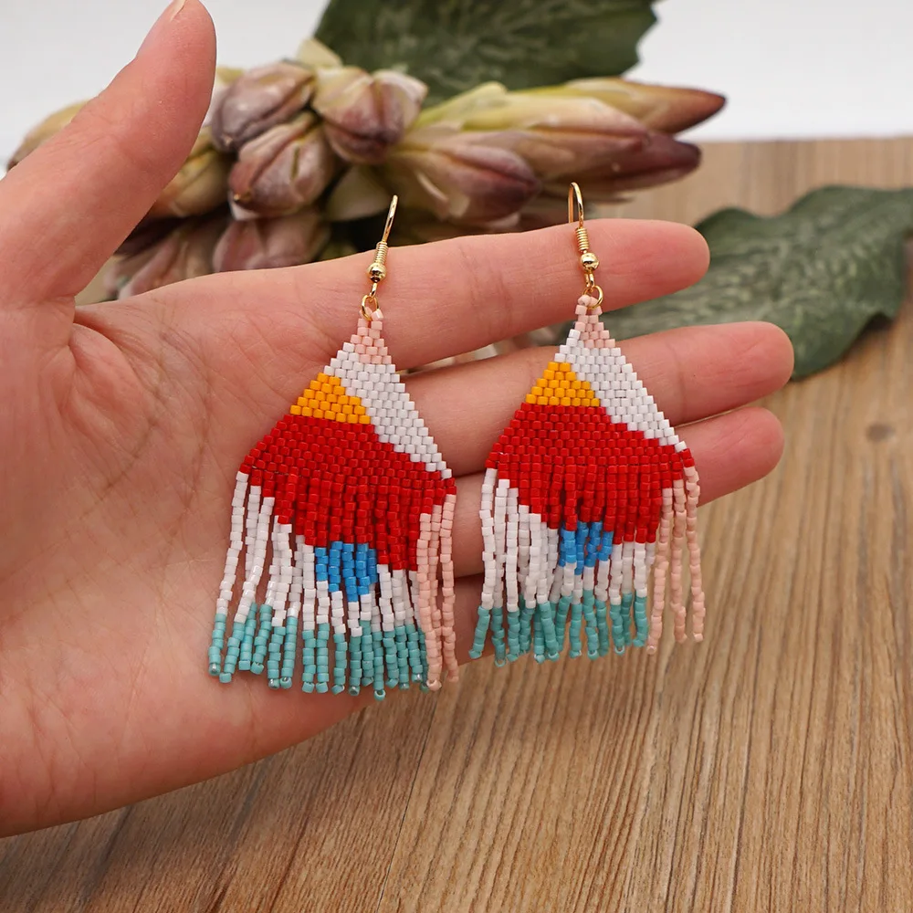 

Beaded earrings Tassel Irregularity Design Originality Geometry Hand knitting Bohemia Alloy Tide Simple Rice bead earrings