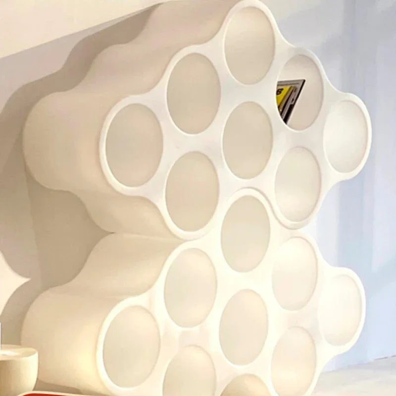 

Cloud bookshelf hollowed out storage hole placement