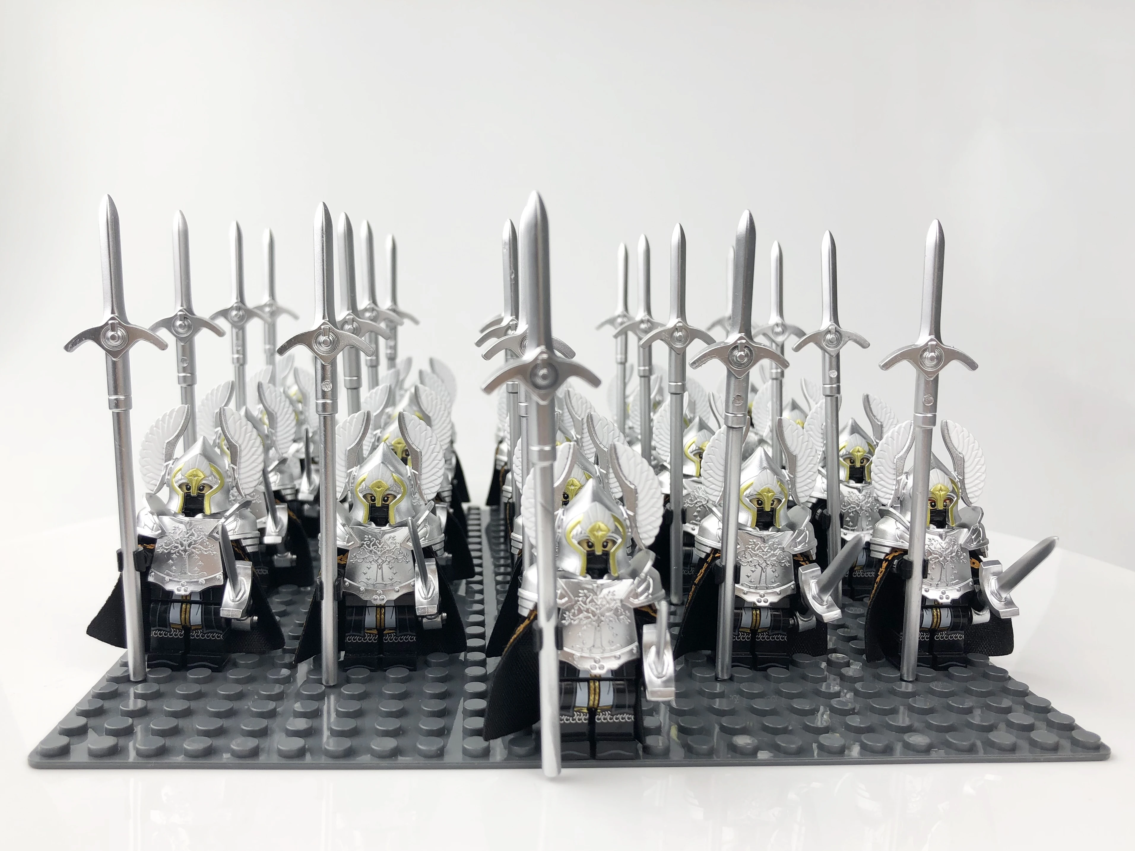 21 unids/lote Dane pies de hierro Eomer Rohan Warriorr vs Uruk Hai figuras del ejército con escudo espada arco lanza juguetes de bloques de construcción para niños