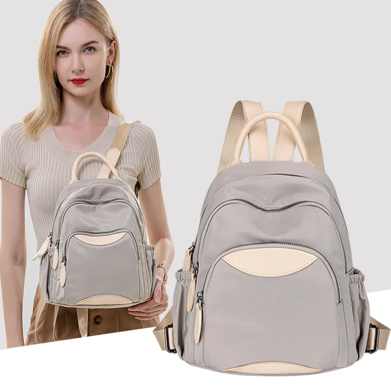 

2026 Summer New Oxford Cloth Backpack Women's Korean Version Easy Fit Large Capacity Leisure Travel Backpacks Student Schoolbag