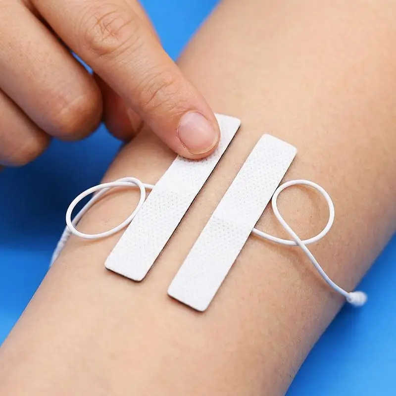 2Pcs Non-woven Self Adhesive Replacement Electrode Pad for Tens EMS Digital Therapy Machine Massager 1.2*6.5cm Nerve Stimulator