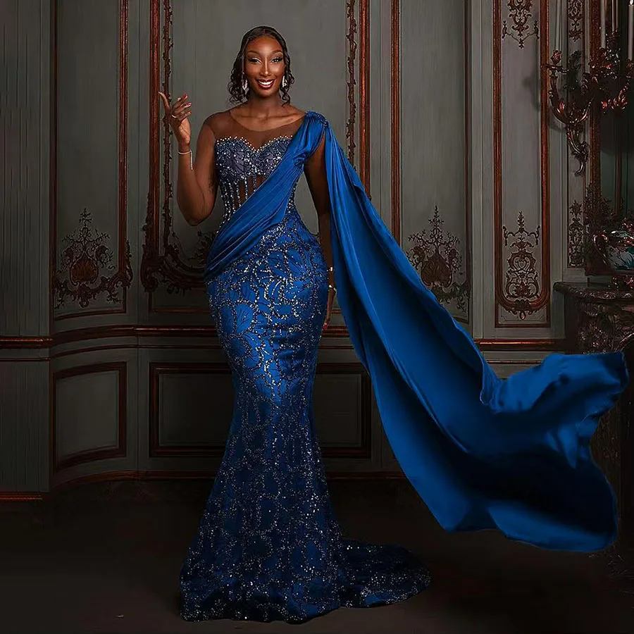 

Royal Blue Mermaid Evening Dresses Beads Illusion Strapless Sleeveless Sequins Prom Dress Aso Ebi Wedding Reception Gowns