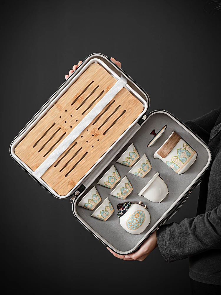 

Портативный уличный дорожный чайный сервиз кунг-фу, шесть чашек, один горшок, новая художественная керамическая чайная посуда, бамбуковый поднос для чая ручной работы, традиционный Ch...