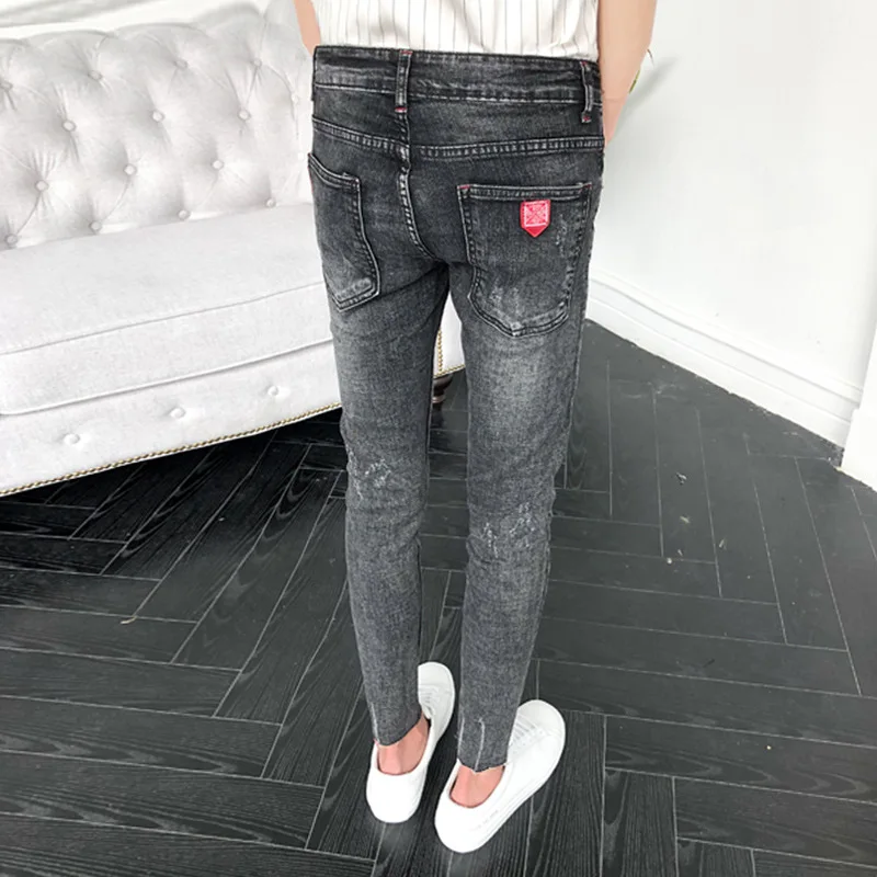 Primavera autunno 2022 adolescenti Jeans Skinny pantaloni da uomo pantaloni coreani Slim strappati pantaloni sottili a matita attillati versatili