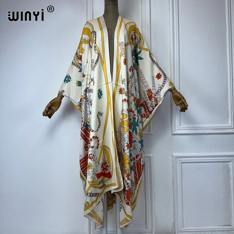 Letnie modne kimono z nadrukiem plażowym WINYI kardigan w stylu Boho eleganckie seksowne świąteczne Kimono plażowe damskie 2024 sukienki kaftanowe