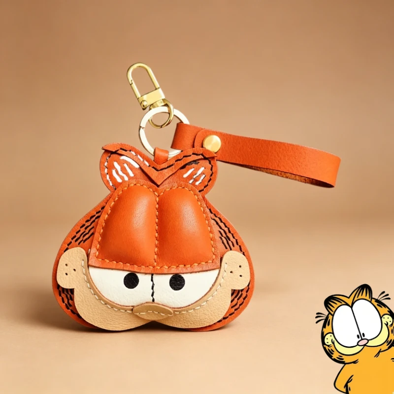 

Garfield cartoon cute leather car keychain kawaii for men and women high-end feel handmade pendant anime merchandise wholesale