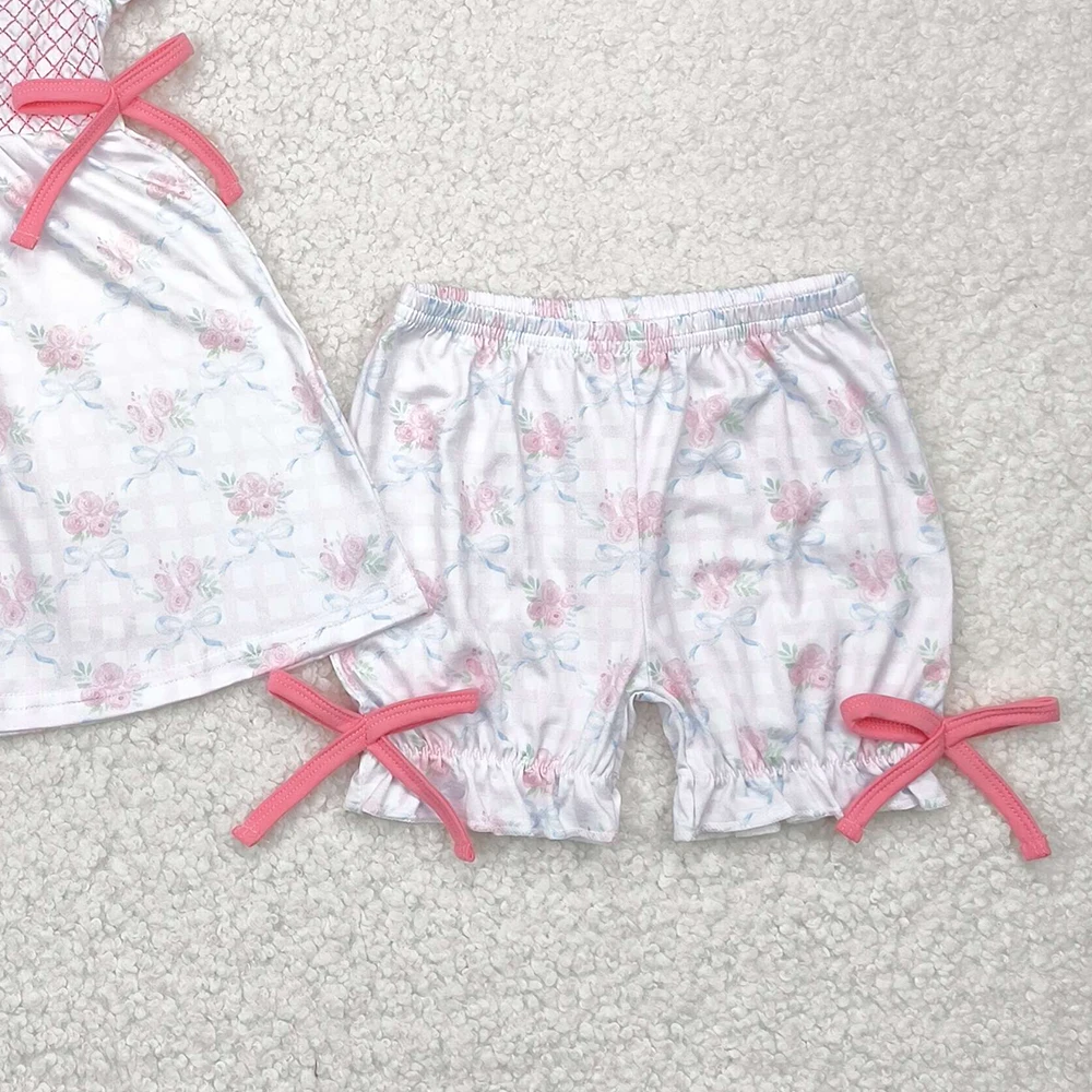 طقم شورت مكشكش بأقواس زهور وردية للفتيات الصغيرات بأكمام قصيرة مع فيونكة منقوشة للفتيات الصغيرات