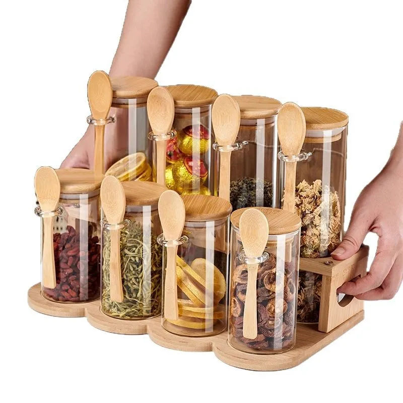 

2026 Seasoning jar set with glass sealed jars for tea portioning and storage. Round design with a spoon for moisture prevention.
