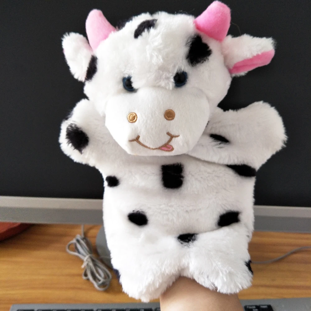 Marioneta de mano de juguete de peluche de vaca de historia de ayuda para guardería