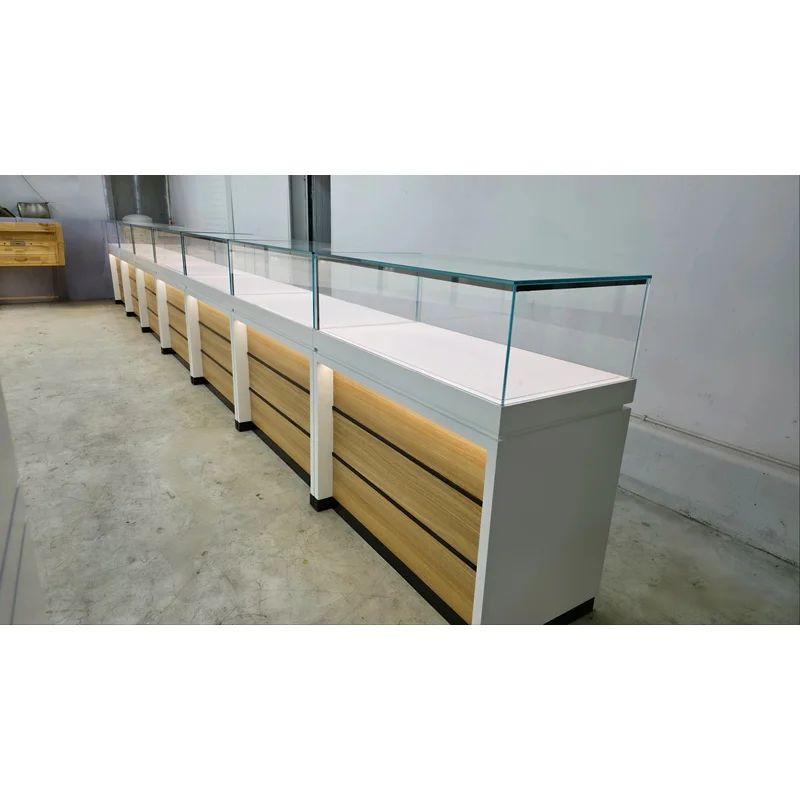 custom.One Stop Jewelry Shop Interior Display Solution LED Wall Jewelry Showcase Glass Display Counter Cabinet with Storage Draw