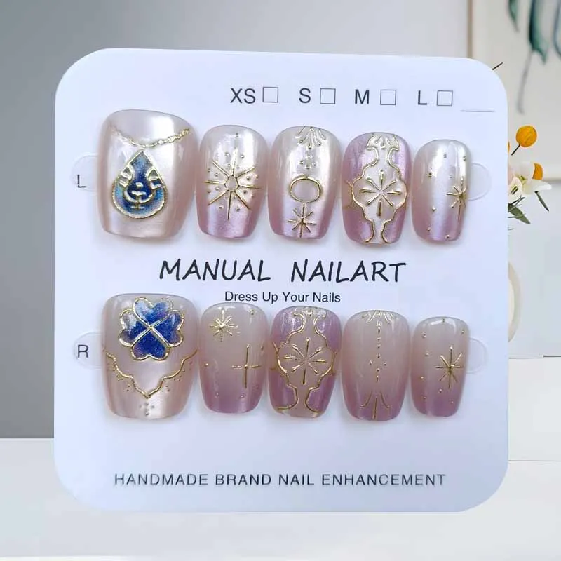 เล็บปลอมกดติดลายแมวตาสี่แฉกน่ารัก 10 ชิ้น สีขาวประดับทอง สวยหรู ระดับไฮเอนด์ สำหรับตกแต่งเล็บ