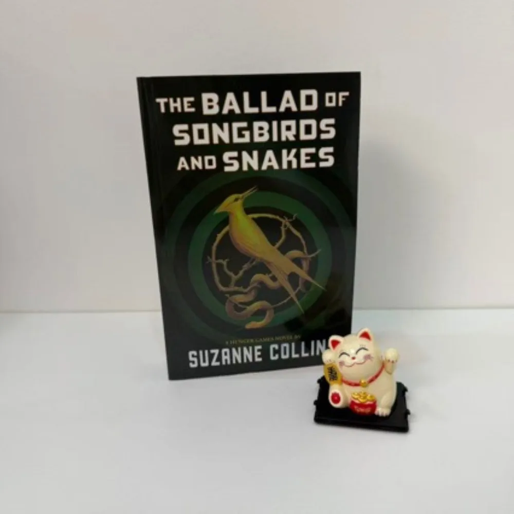 

The Ballad of Songbirds and Snakes by Suzanne Collins Hunger Games Prequel President Snow's Origin Dystopian Dark Fantasy