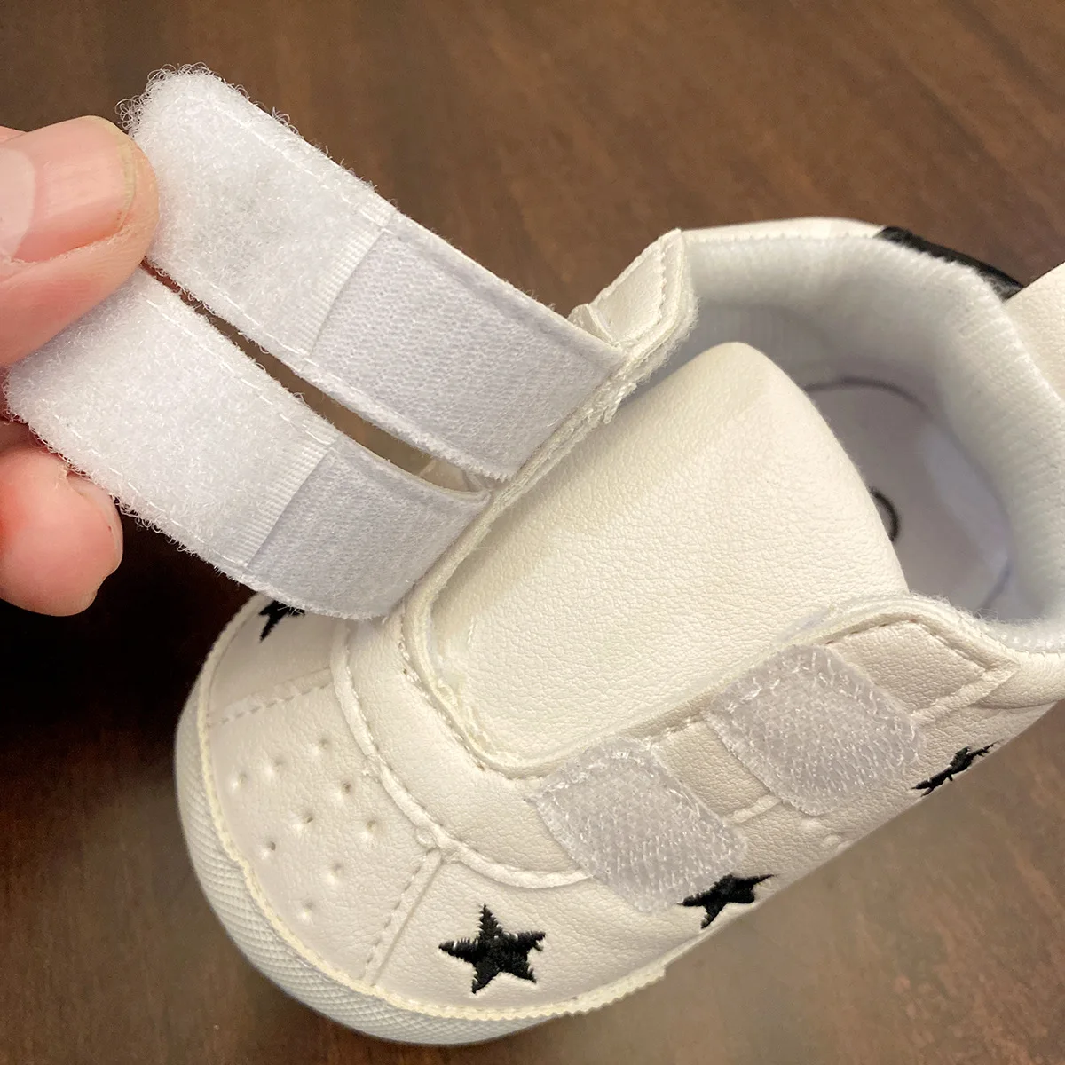 Primavera y otoño nuevo 0-1 año niño y niña bebé suela suave superficie suave zapatos blancos zapatos para niños recién nacidos