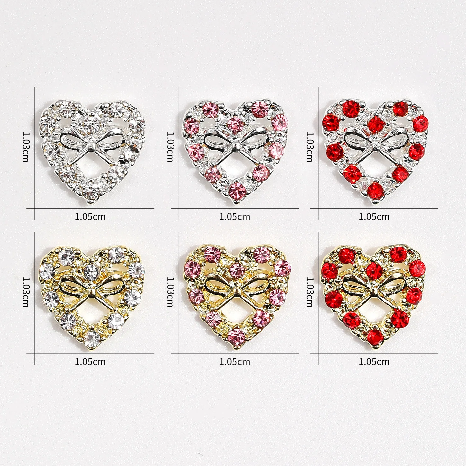 10 pièces 3D alliage de luxe évidé arc coeur Nail Art strass breloques manucure bijoux accessoires ongles décoration fournitures