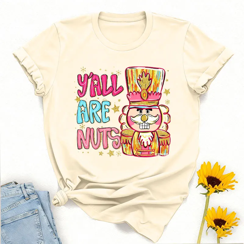Y'all Are Nuts Coquette كسارة البندق Preppy عيد الميلاد Png السكر البرقوق الجنية المكسرات حول Brushstroke Crewneck تي شيرت مطبوع بلايز