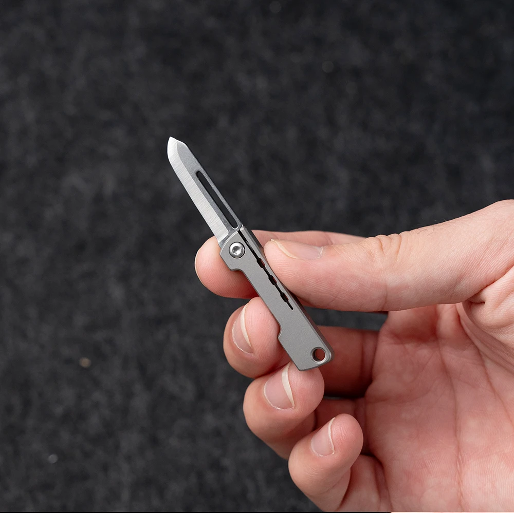 Titanium alloy folding mini knife, portable hanging keychain, unboxing, express delivery knife, household all-in-one knife