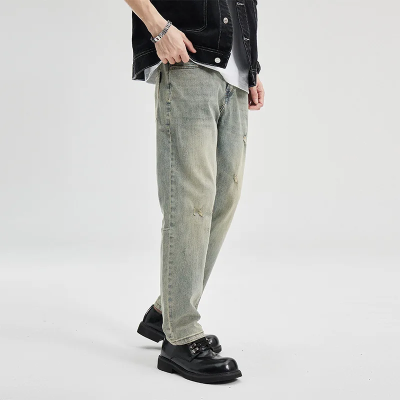 アメリカンウォッシュ加工のヴィンテージ風メンズジーンズ、フィット感があり、ややテーパード、ストレッチ入り