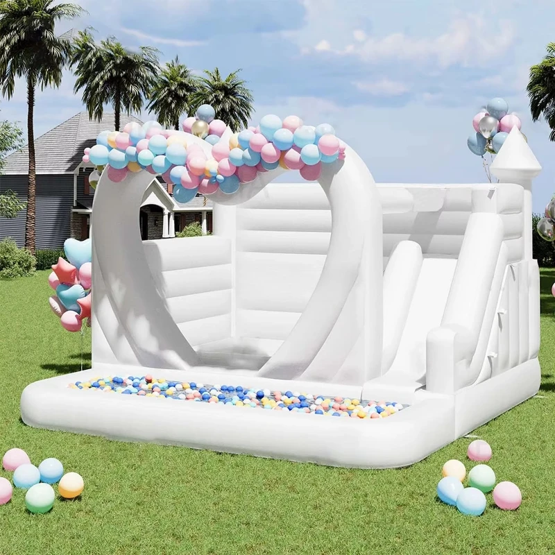 

White Castle bounce house with ball pit and slide for wedding and party decorations