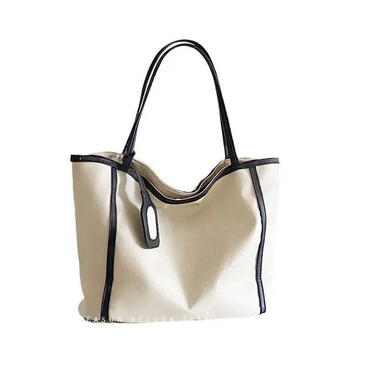 New Fashion Versatile Texture Large Capacity Simplicity with Hanging Tag Accessories Splicing Shoulder Support Special Bag