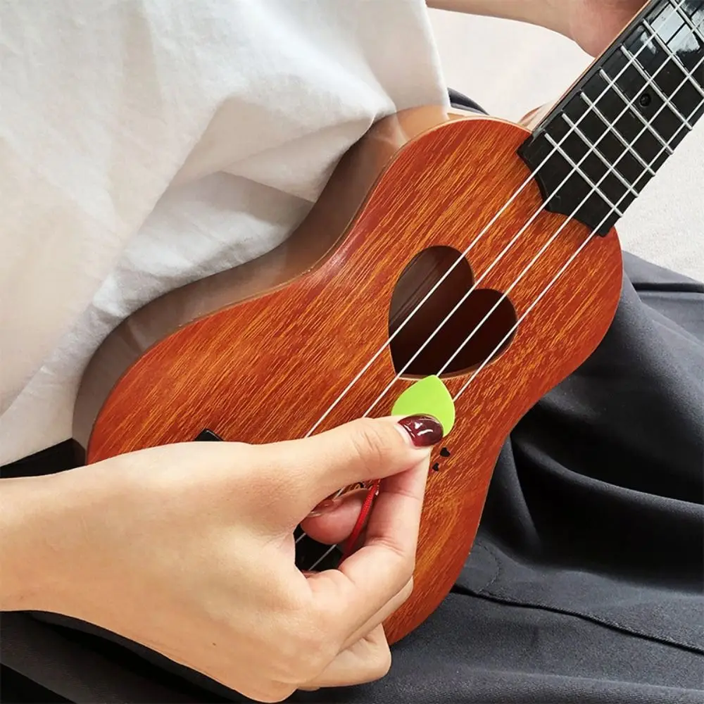 4 cordas ukulele instrumento musical brinquedo yukrili brinquedos botão de corda ajustável simulação ukulele brinquedo jogável clássico