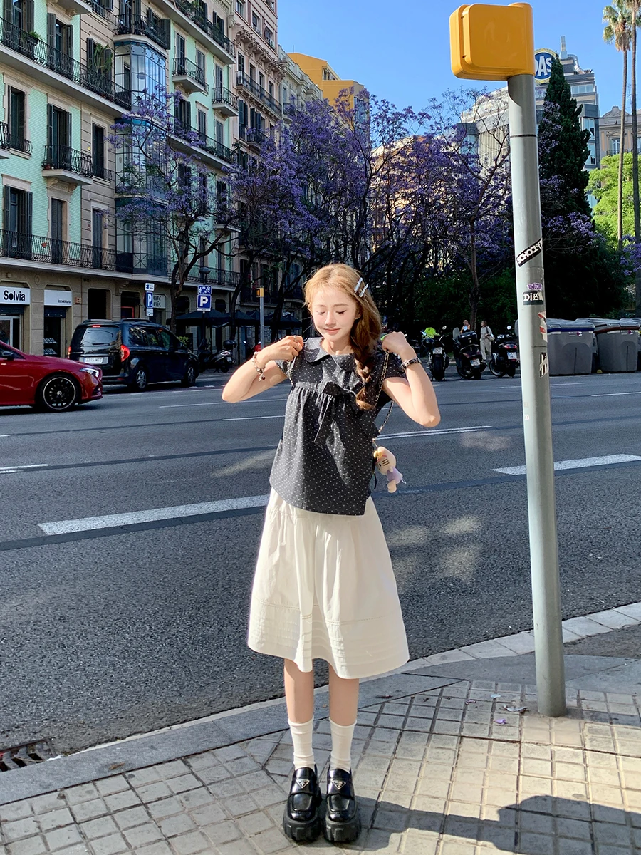 

Белая кружевная юбка-миди с вырезами и кружевными вставками для повседневной носки