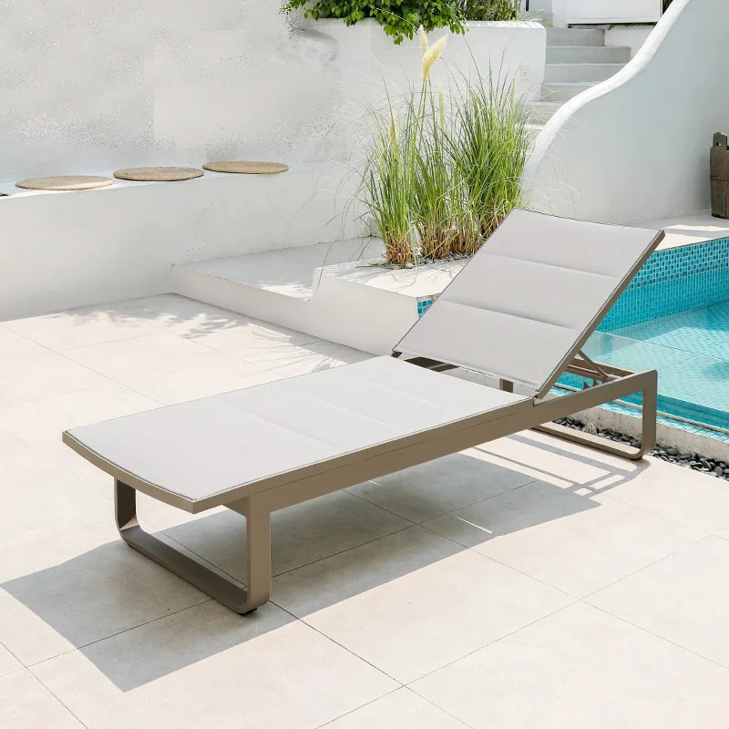 Beach chairs loungers villa courtyard outdoor swimming pool