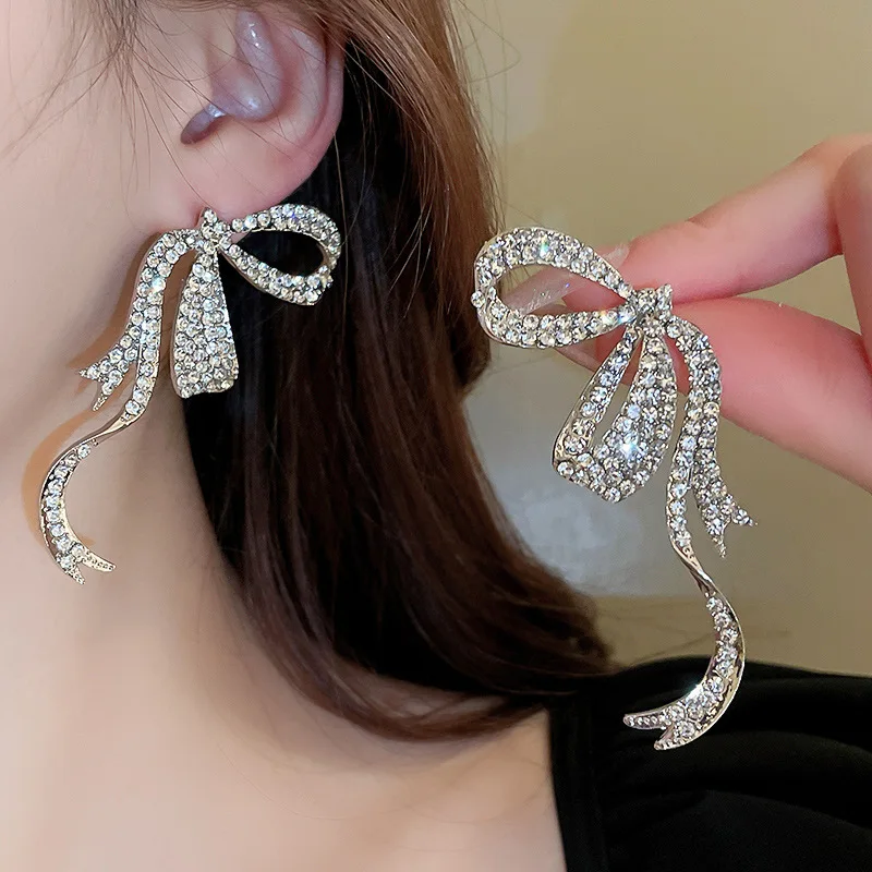 Light luxury style diamond-encrusted bow streamer silver needle earrings Fashion,elegant temperament and high-end,sensual