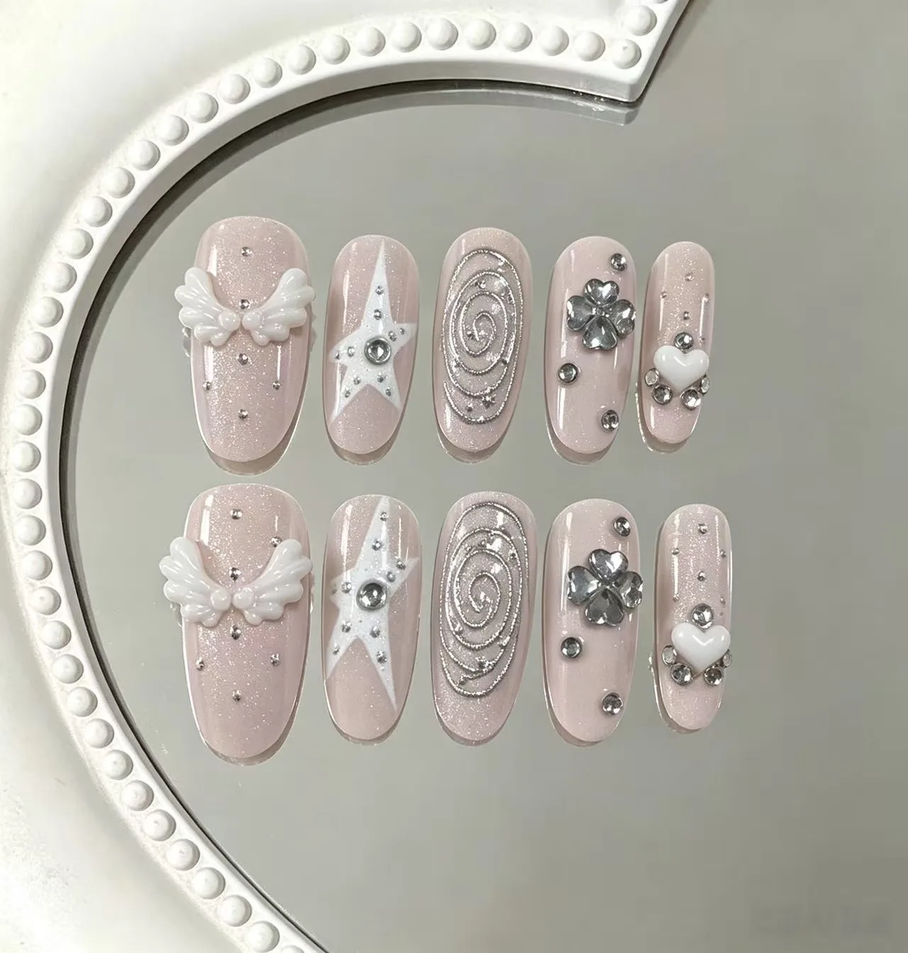 10 Pieces of Nude Pink Fine Glitter Angel Clover Star Press-On Nails, Smooth and Rounded Long Oval Shape, Gently Elongate the Finger Lines, Enhance Wide and Short Fingers, Not Easy to Snag When Typing, Versatile for Dating, Campus, Wedding Photos, and Commuting.