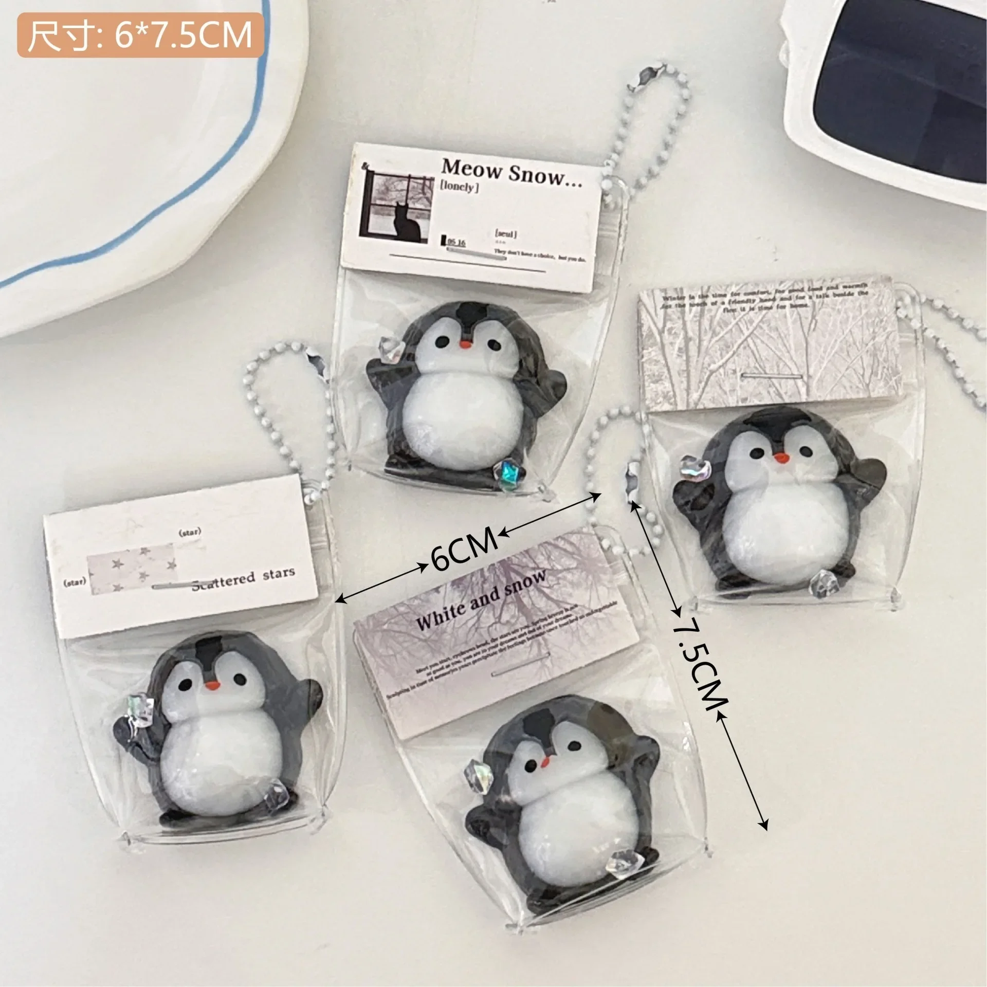 The new penguin pinch music doll small pendant girl backpack keychain mini pinch slow rebound decompression toy