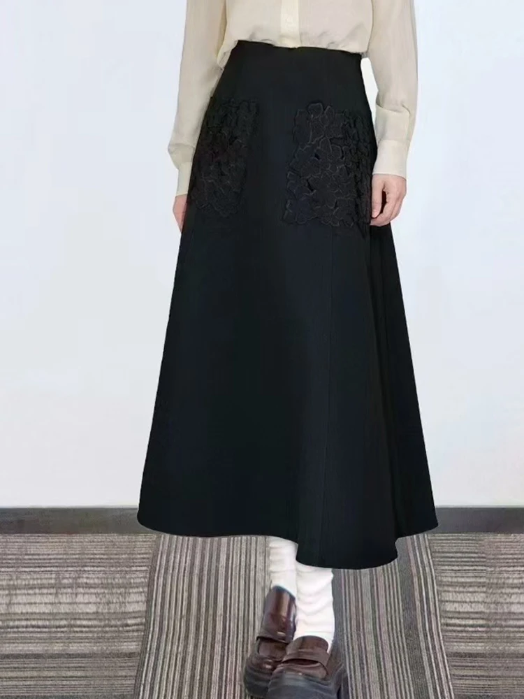 

Fashion solid color three-dimensional applique embroidered high waist skirt autumn women's new swing temperament Joker skirt.