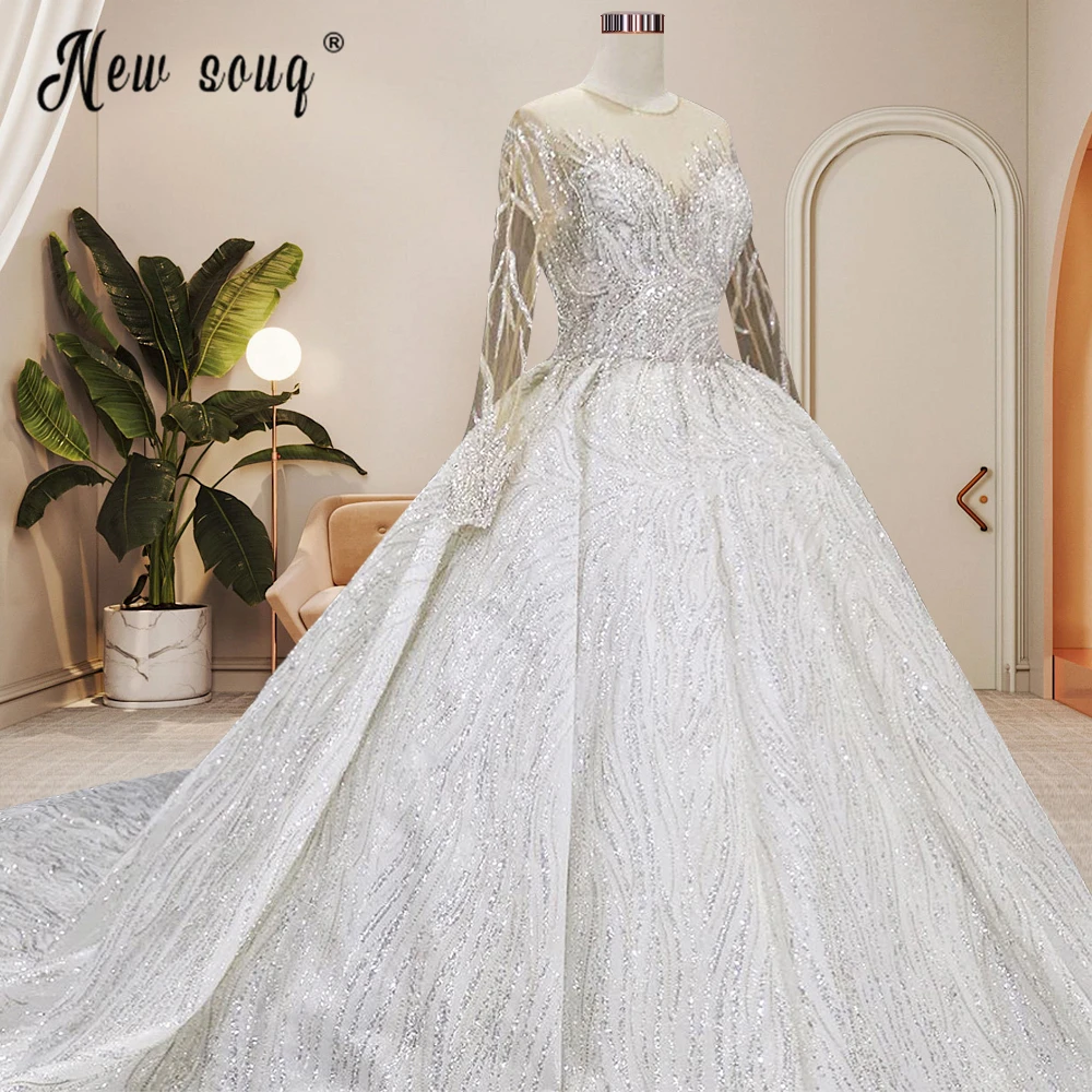 Glitter Sheer Neck Bling Ball Gown abito da sposa Plus Size Custom Dubai manica lunga abiti da sposa con perline pesanti Vestido De Novia