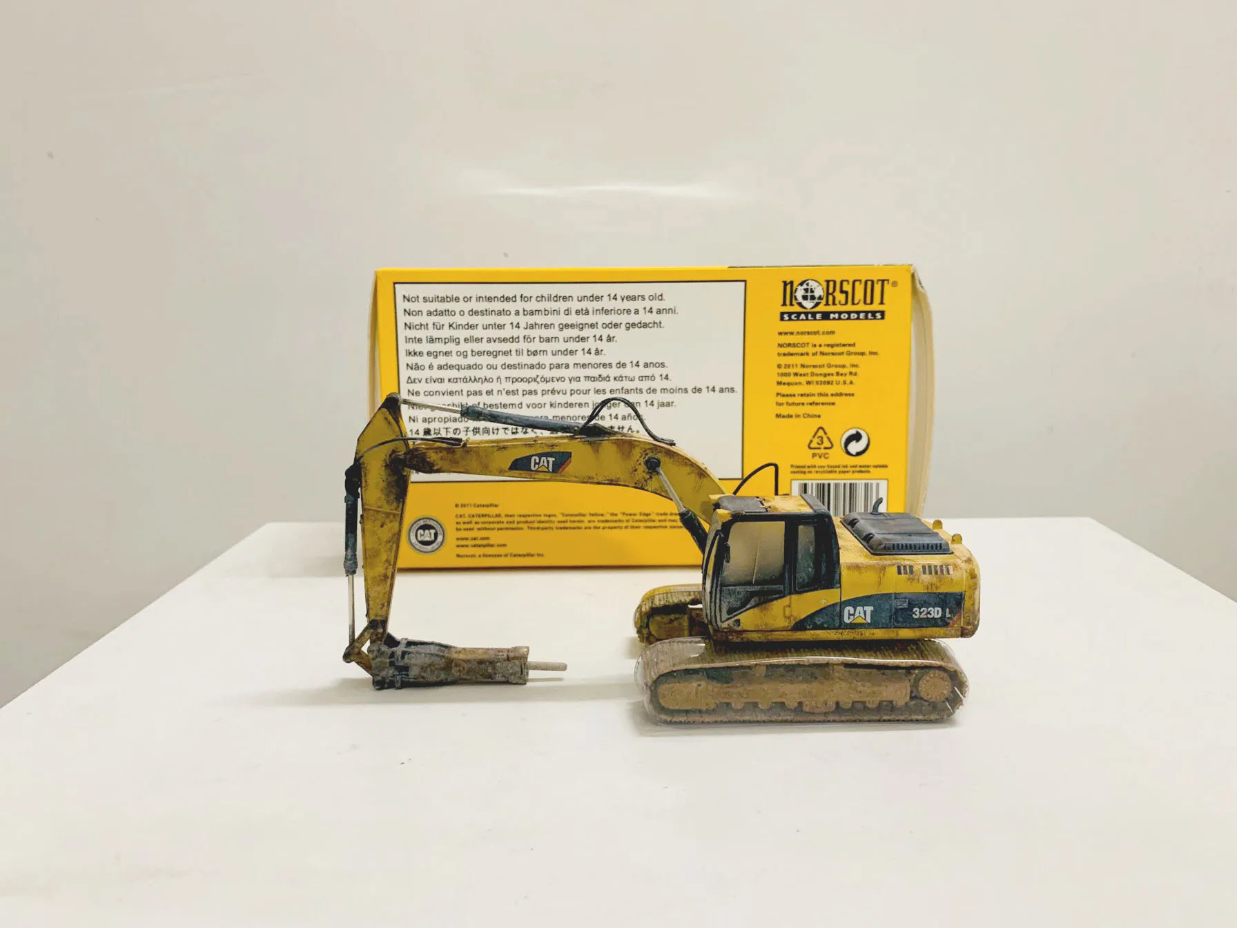 

323D L Hydraulic Excavator With H120E Hydraulic Hammer Muddy Edition 1:50 Scale DieCast Metal Collectible Model 55282 New in Box