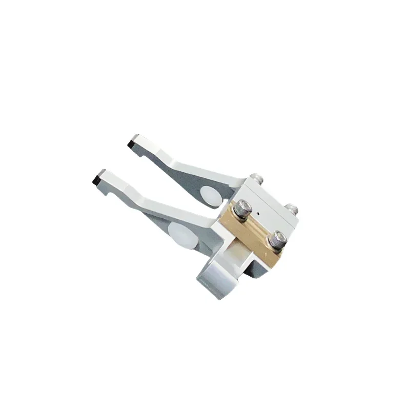 

Swiss welder conveyor system pusher jaw assembly