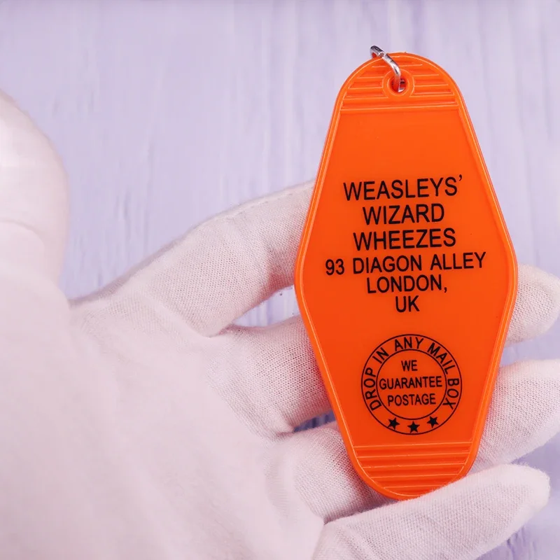 H-P Wizard World Weasleys' Wizard Wheezes porte-clés Vintage hôtel porte-clés motel porte-clés Orange cadeau de noël