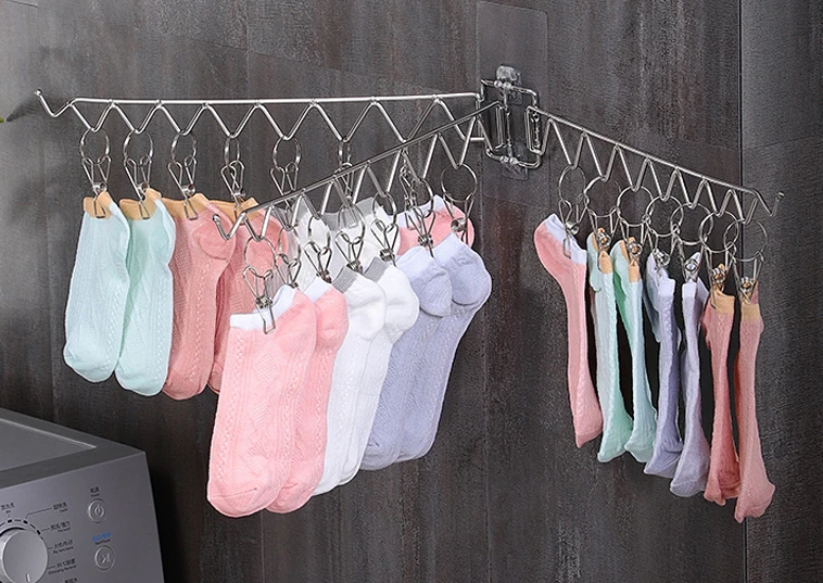 

Stainless steel folding and punching free wall hanging clothes hanger