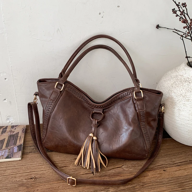 أنيقة المرأة شرابة حقائب كتف واحدة الكورية الرجعية VersatilePU حقائب عادية سعة كبيرة حقيبة تسوق سفر 2026 الاتجاه الجديد