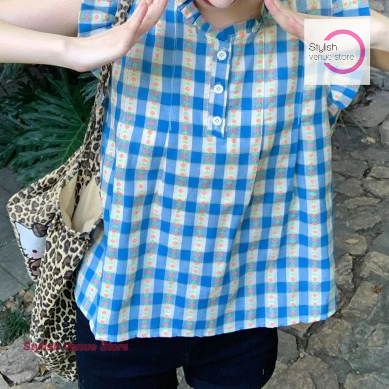 

Korean sweet foreign style plaid doll sleeveless shirt summer fashion design sense age-reducing temperament vest loose top