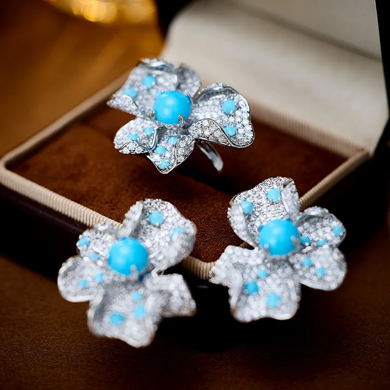 

Light luxury and high-end, heavy-duty blue turquoise flower earrings, women's ring s925 silver needle elegant earrings