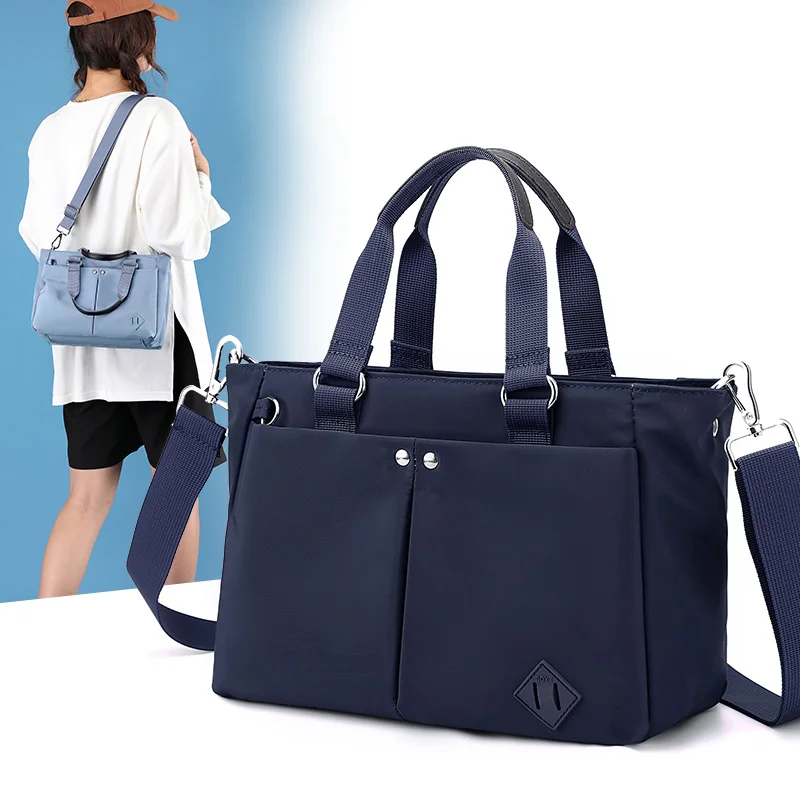 2023 clássico bolsa de ombro grande capacidade náilon bolsa à prova dwaterproof água casual alça superior bolsa de viagem feminina bolsa mãe